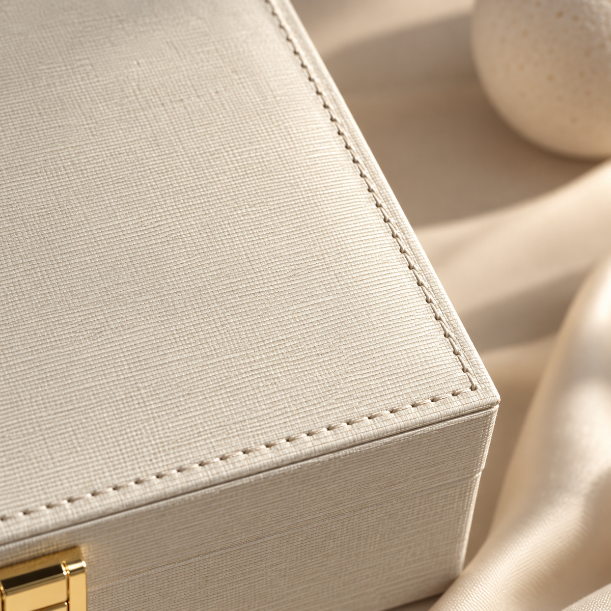 A close-up of the leather casing and its custom stitching